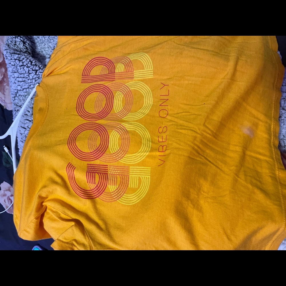 A yellow /orange top